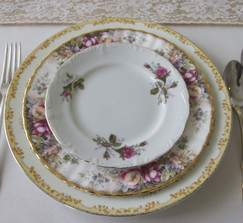 mismatched vintage china and decor for rent