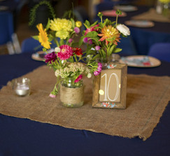 Burlap ribbon, table squares, and yardage