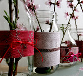 Recycled vases, pots, and tea lights