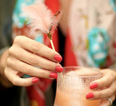 Feather-topped drink stirrers
