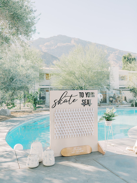 wedding calligraphy on skateboard escort cards